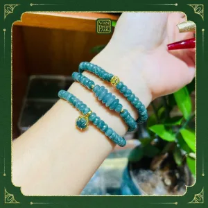 Chuỗi bánh xe Lam Ngọc mix charm 10K